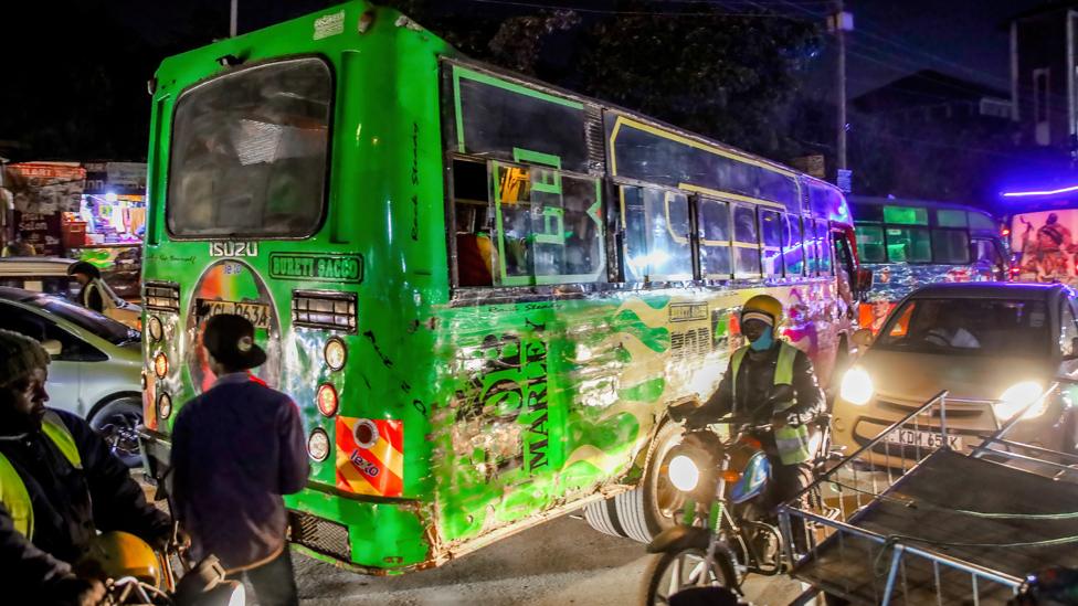 Heavy traffic is seen along a road in Kibera in Nairobi, Kenya - December 2023