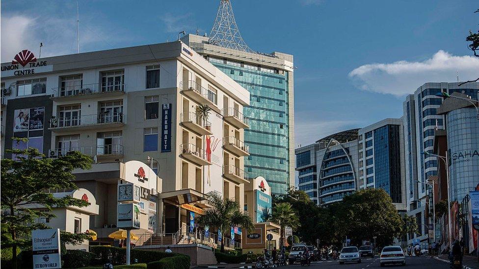 Kigali's business district. Kigali, with a population of more than one million, is Rwandas capital and main city.