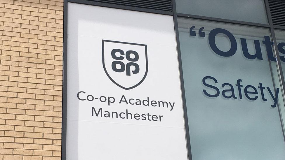 Co-op logo on school