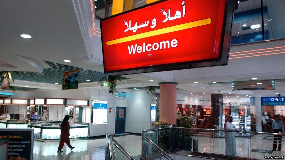 A McDonald's sign reads 'Welcome' in both English and Arabic October 15, 2002 in Dubai, United Arab Emirates