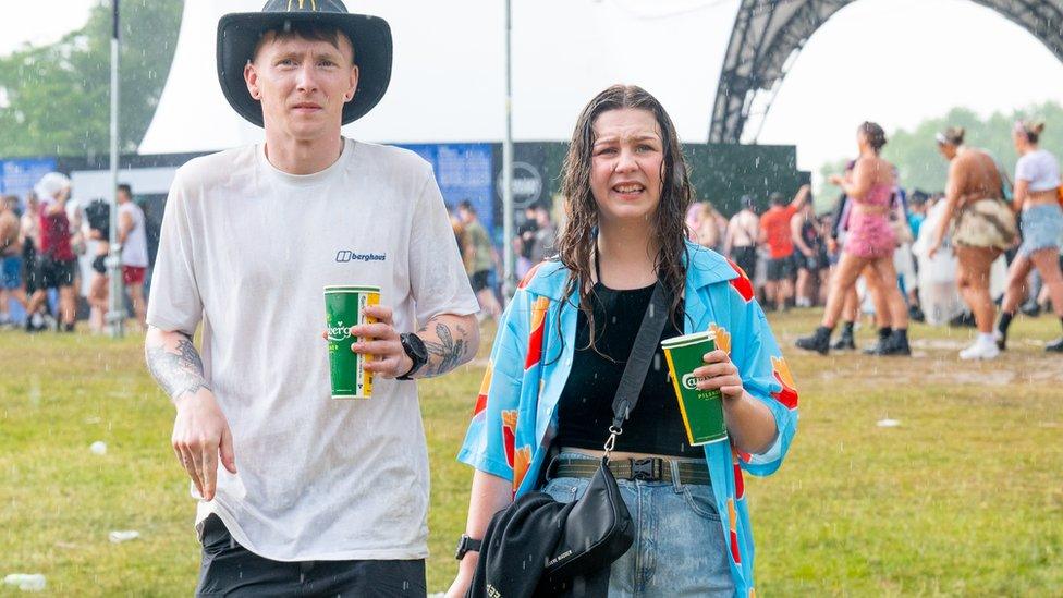 Festival-goers at Parklife endure a thunderstorm