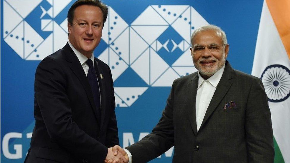 In this file photo taken on November 14, 2014, Britain"s Prime minister David Cameron (L) shakes hands with India"s Prime Minister Narendra Modi (R) during a bilateral meeting on the sidelines of the G20 Summit at the Brisbane Convention and Exhibitions Centre (BCEC) in Brisbane.