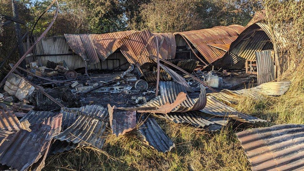 A damaged shed