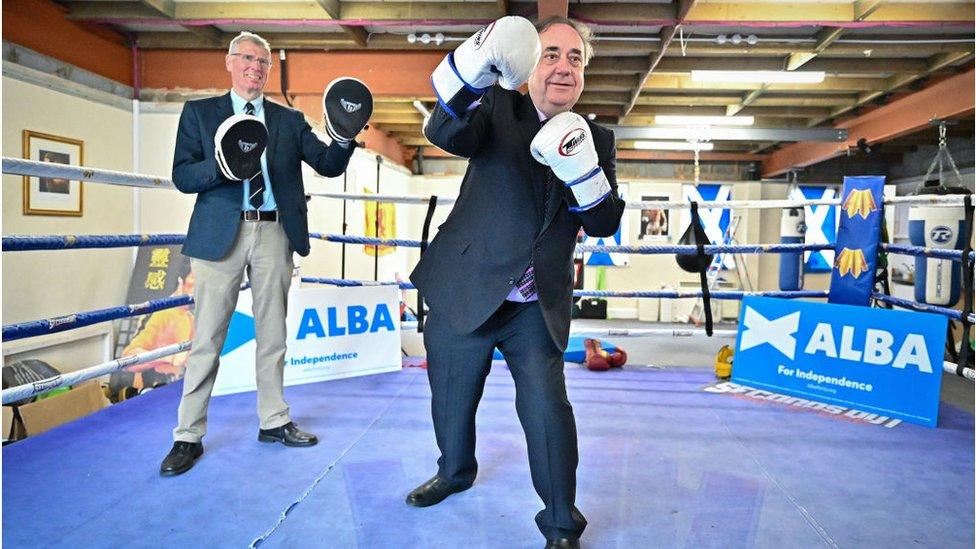 Former First Minister and leader of the Alba Party, Alex Salmond, poses for a picture with Kenny MacAskill in the boxing gym of former world champion Alex Arthur