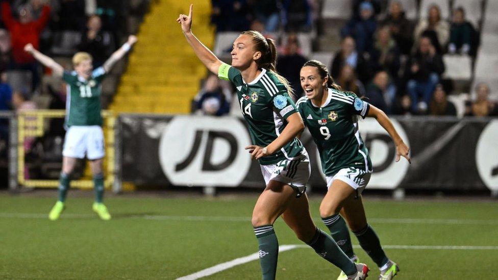 Lauren Wade celebrates after scoring NI's first goal