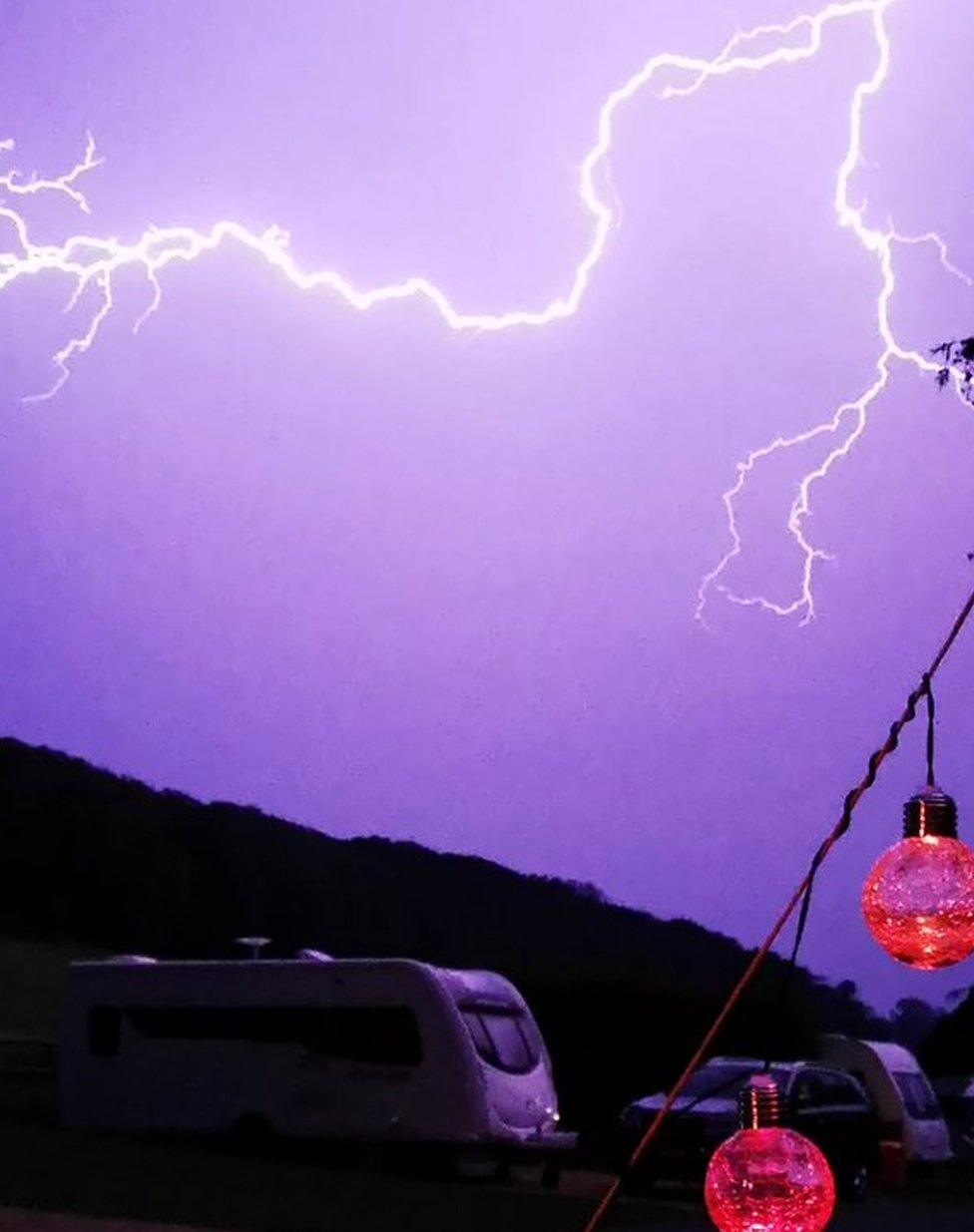 Lightning across the sky at Swiss Farm touring and camping