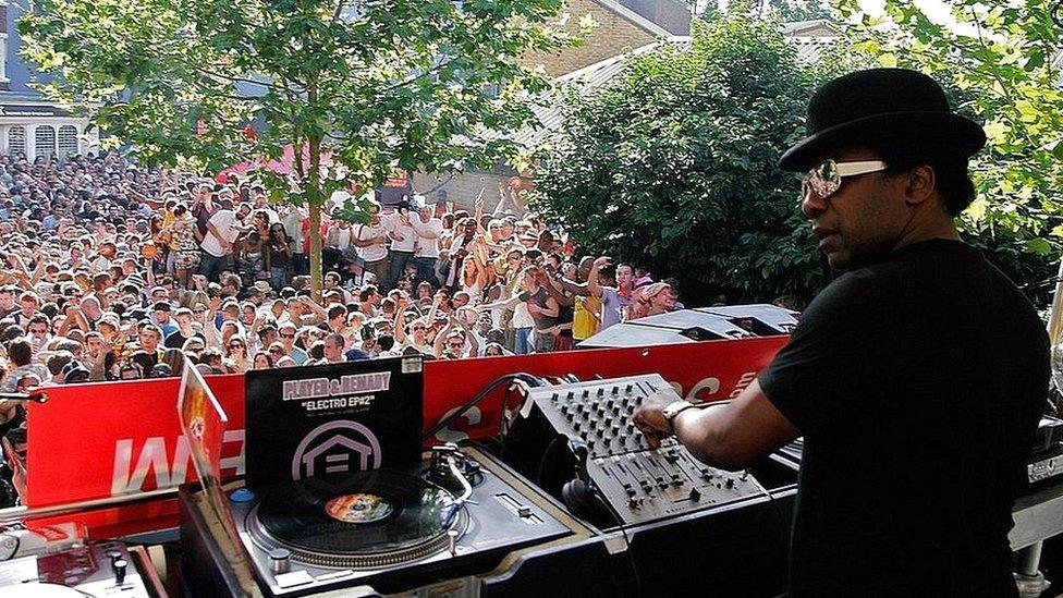 Norman Jay plays his set to a huge crowd from the Good Times bus during the Notting Hill Carnival 2006