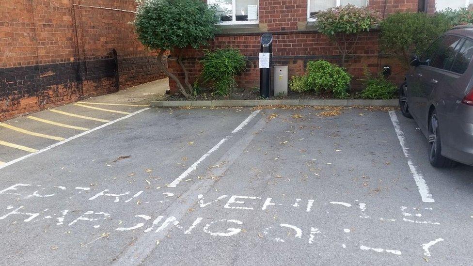 Electric charging bay