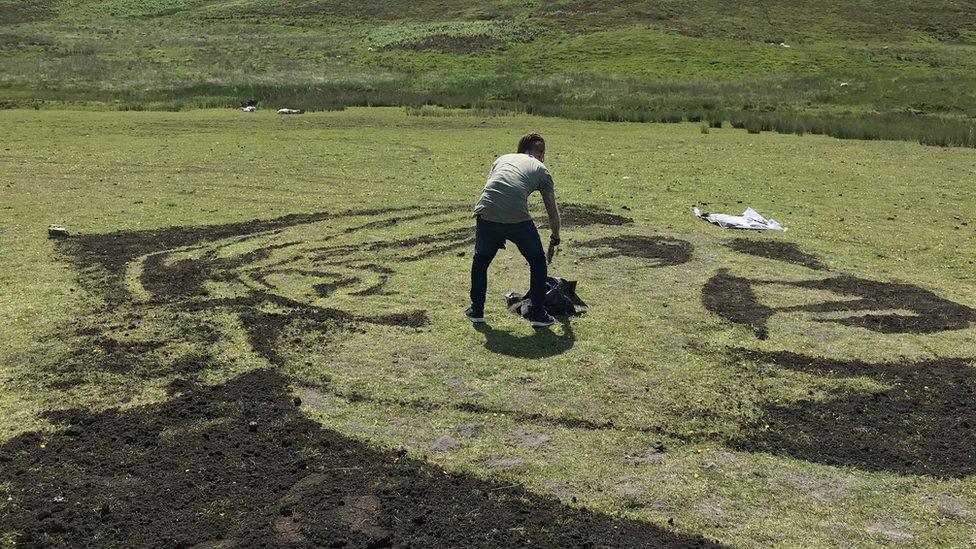 A stone and dust portrait of Aneurin 'Nye' Bevan, on Trefil moorland