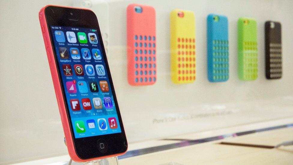 Different colour versions of the iPhone 5C with their coloured cases, September 2013