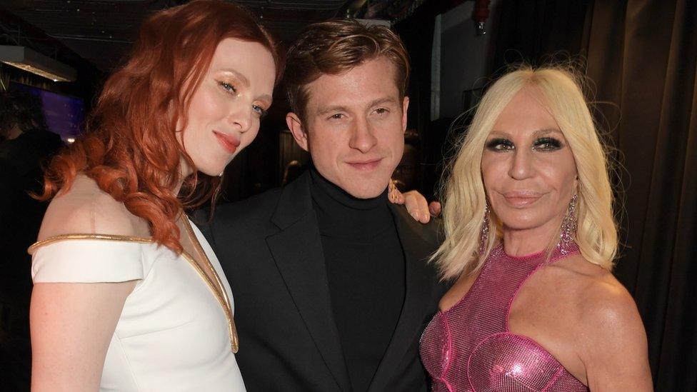 (Left to right) Karen Elson, Daniel Lee and Donatella Versace