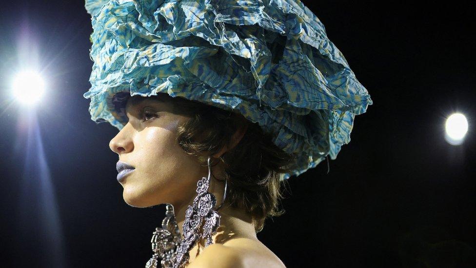 A model presents a creation by designer Andreas Kronthaler as part of his Spring/Summer 2024 Women's ready-to-wear collection show for fashion house Vivienne Westwood, during Paris Fashion Week in Paris, France