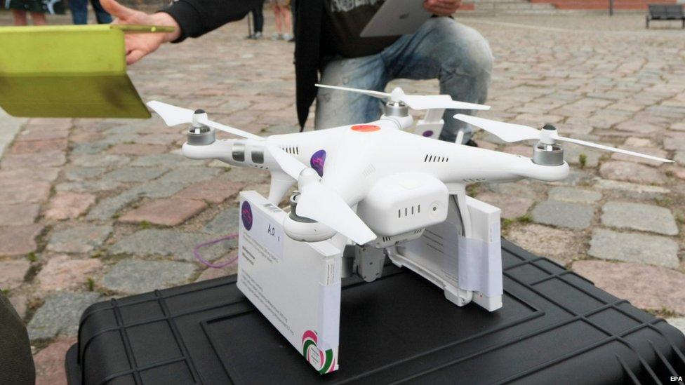 A drone fitted with packets of abortifacient pills is prepared for its flight to Slubice in Poland, in Frankfurt an der Oder, Germany, on Sunday