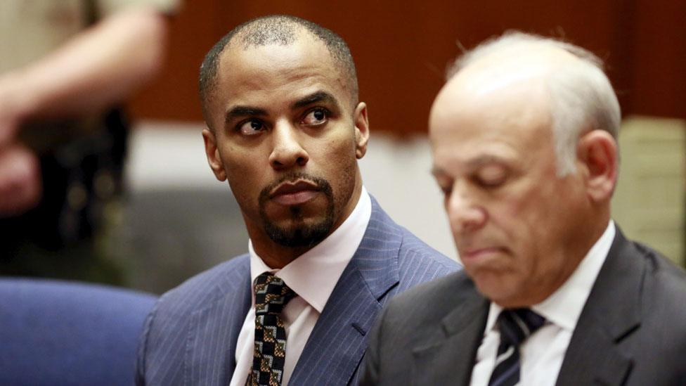 Darren Sharper with his lawyer at sentencing