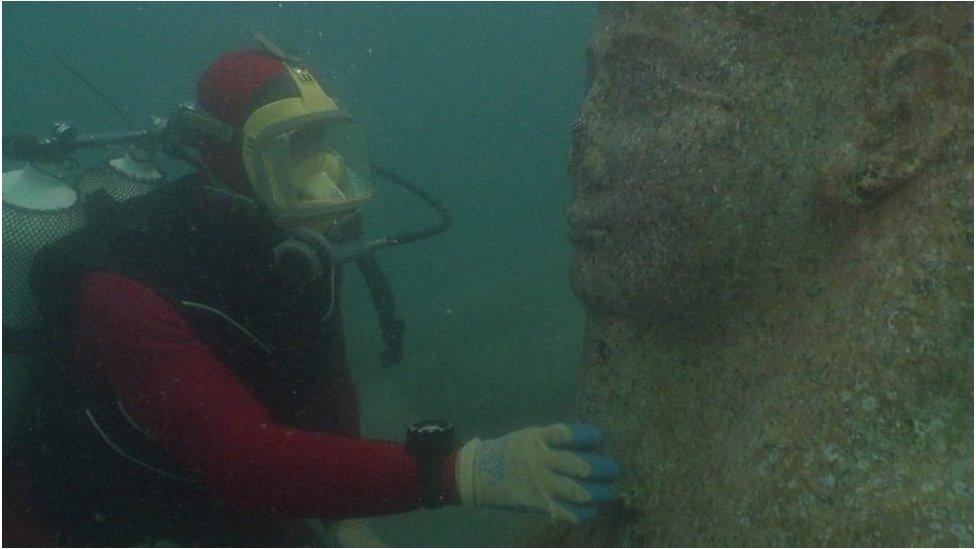 Diver and statue