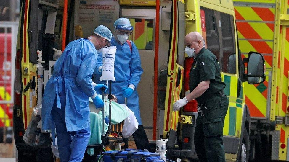 General photo - staff helping patient from ambulance