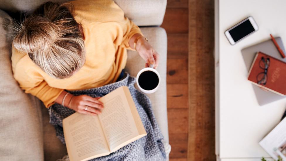 Woman reading book