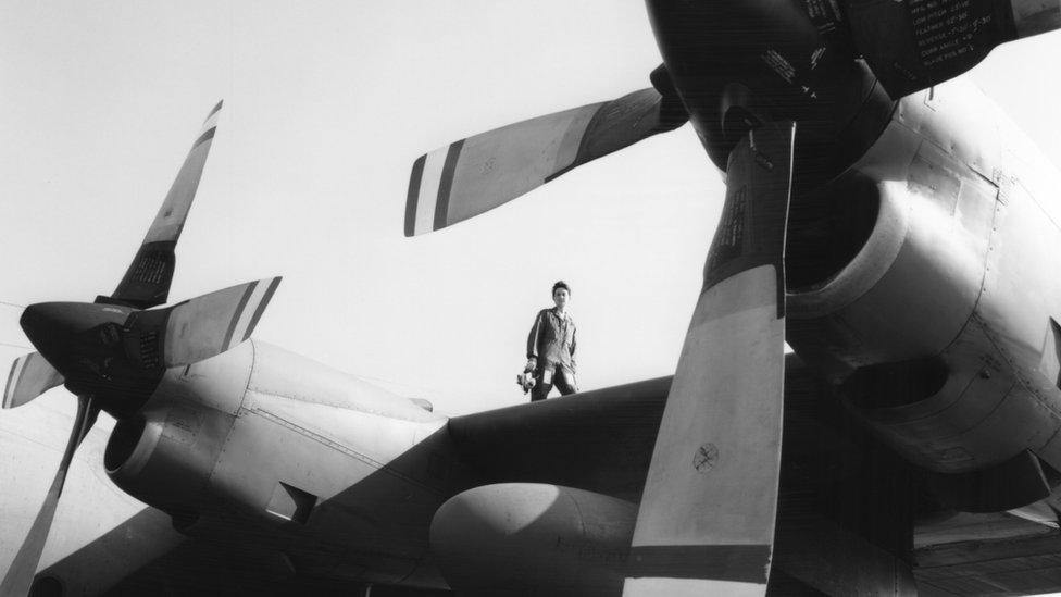 Julie on top of a C-130