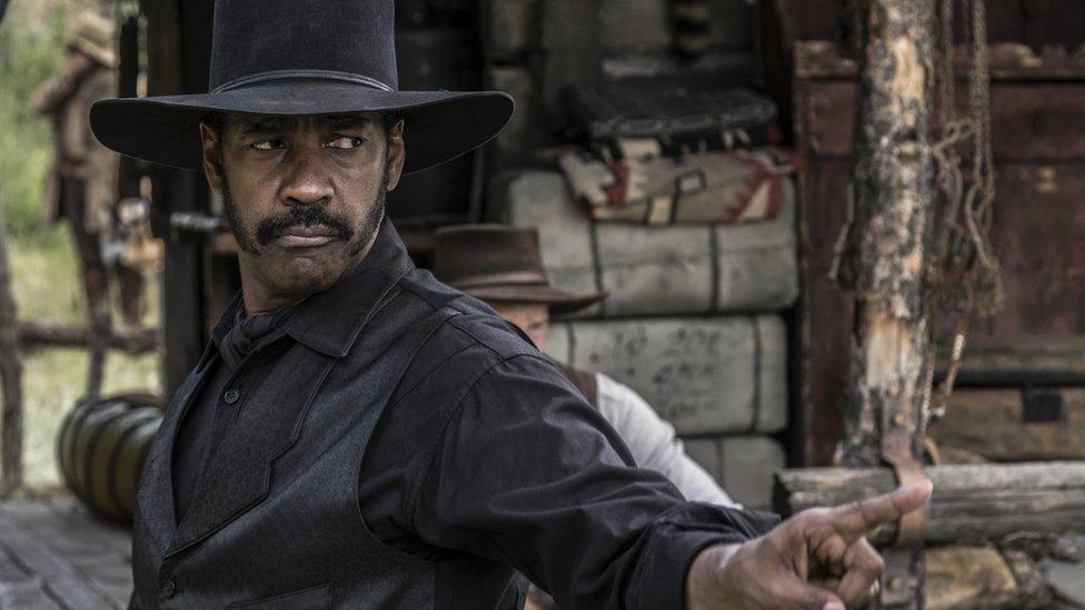 Denzel Washington as gunslinger Sam Chisolm in The Magnificent Seven