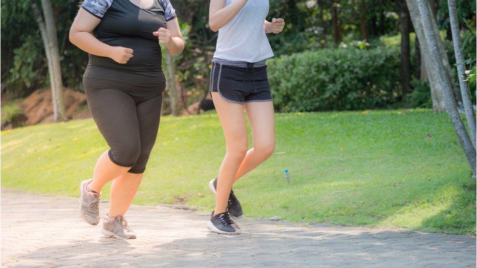 Two women running