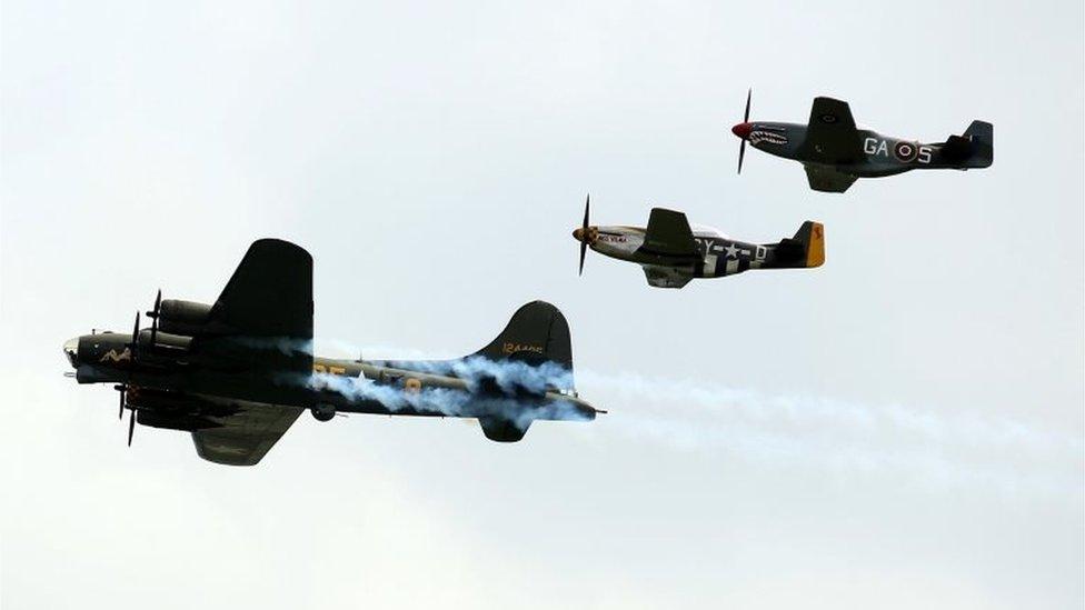 Flying Fortress and two P-51 Mustangs