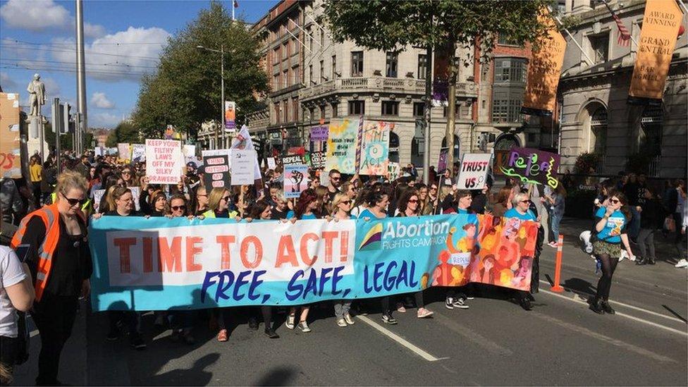 People marching through Dublin