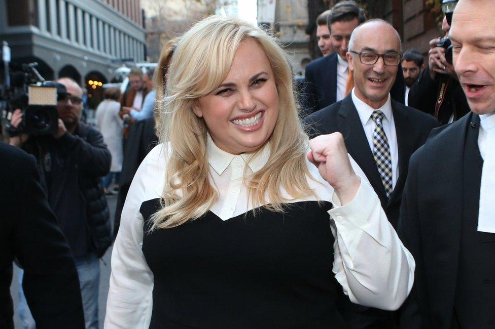 Rebel Wilson celebrates as she leaves court in Melbourne, Australia, in June