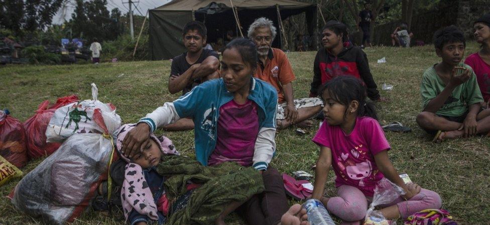 People in temporary evacuation centre in Manggis village, Bali