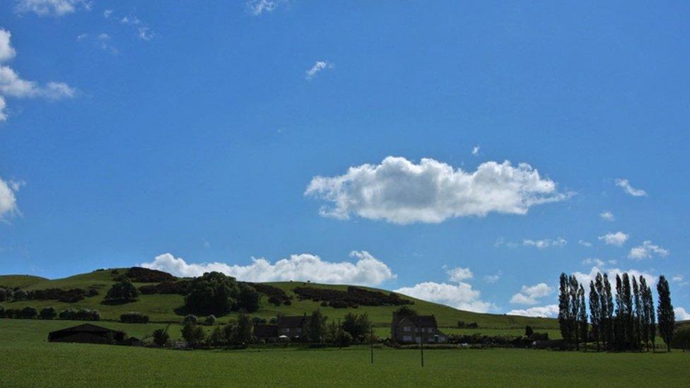 Farm land near Postlip, a village in the Cotswolds in Gloucestershire