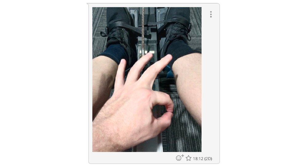 A photo posted to White Stag Athletic Club's group chat showing a member performing the white power OK salute