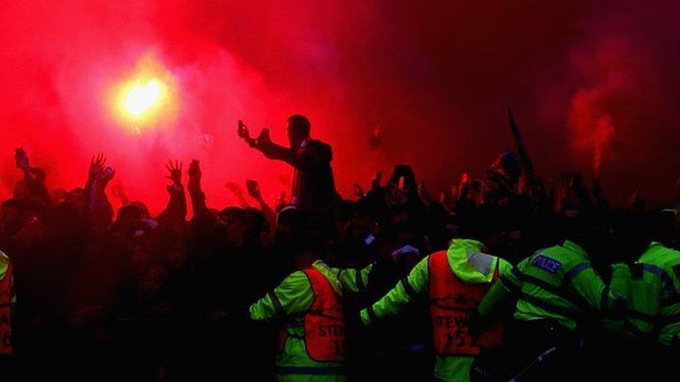 Liverpool fans light flares before the Champions League semi-final with Roma at Anfield