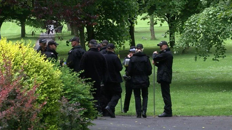 Police searching the undergrowth