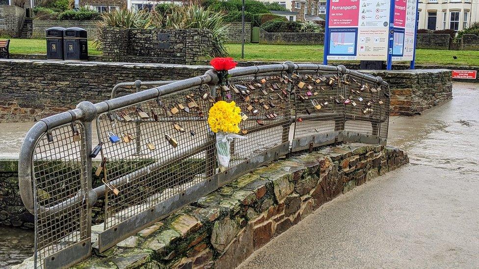 Padlocks on bridge