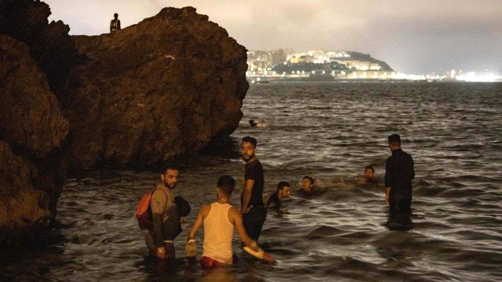 Migrants in water at Fnideq, 18 May 21