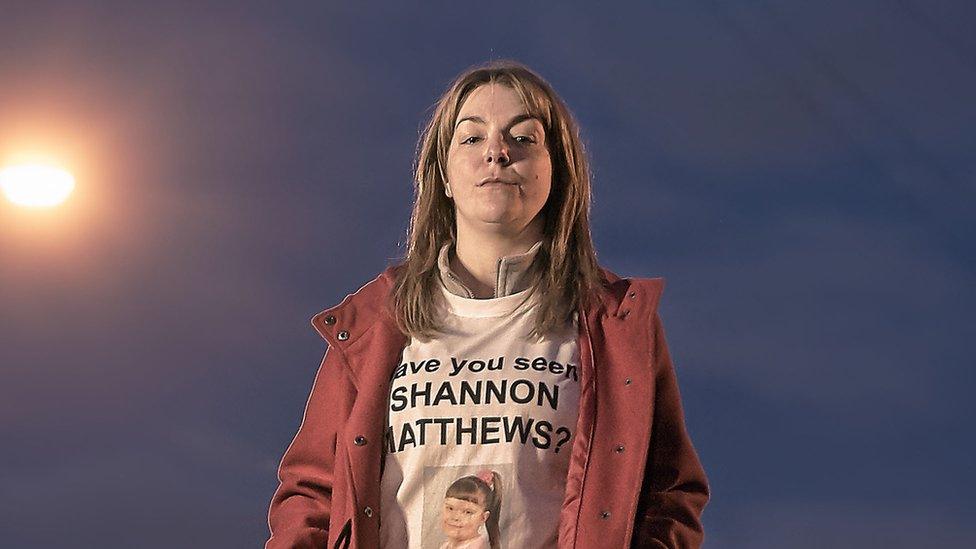 Sheridan Smith as Julie Bushby, wearing a Shannon Matthews tshirt