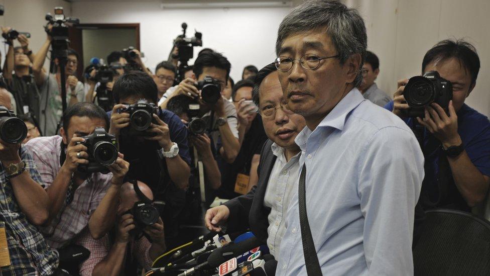 Freed Hong Kong bookseller Lam Wing-kee stands before giving a news conference in Hong Kong Thursday, June 16, 2016.