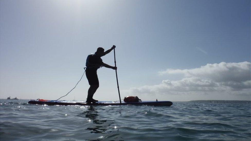 Joe Cartwright on a paddleboard