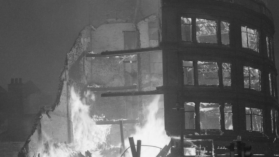 Burning buildings in Manchester after a German air raid