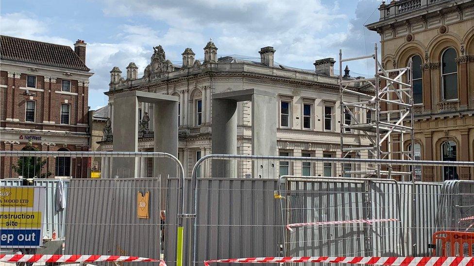 A photo showing when one of the plinths was removed and replaced by scaffolding