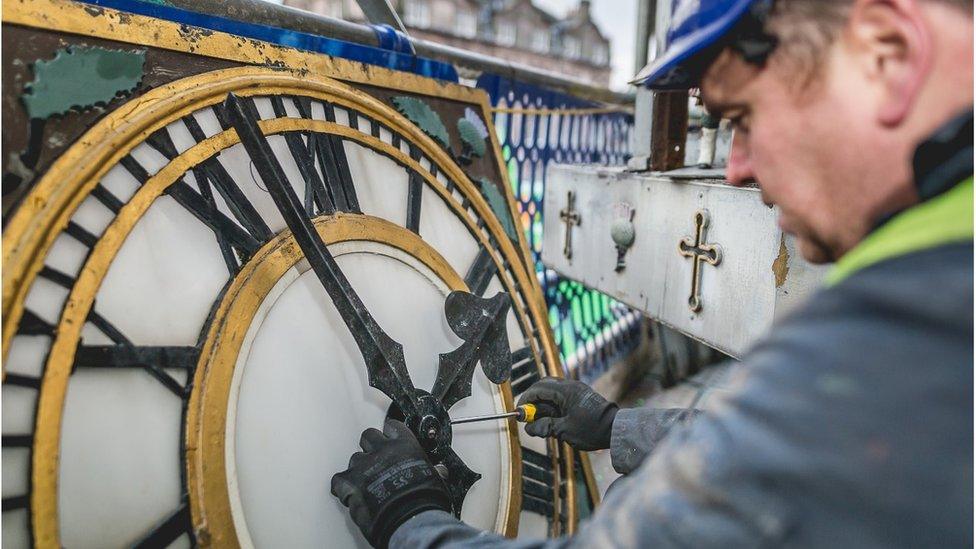 The clock being restored