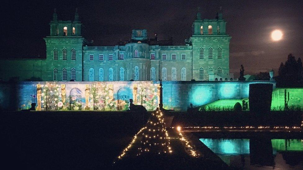 The supermoon over the Christmas light trail at Blenheim Palace