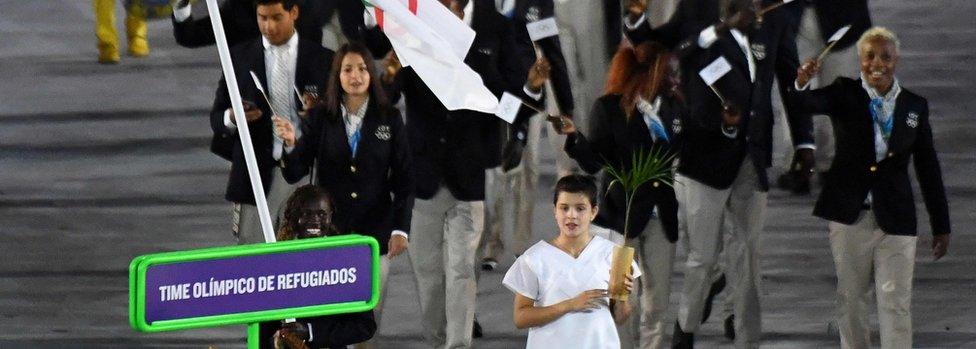 Rose Nathike Lokonyen leads her delegation during the opening ceremony of the Rio 2016 Olympic Games