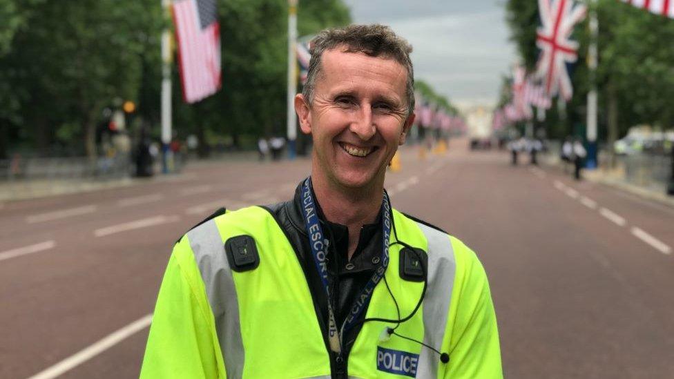 PC Dan Golding standing on the mall in London