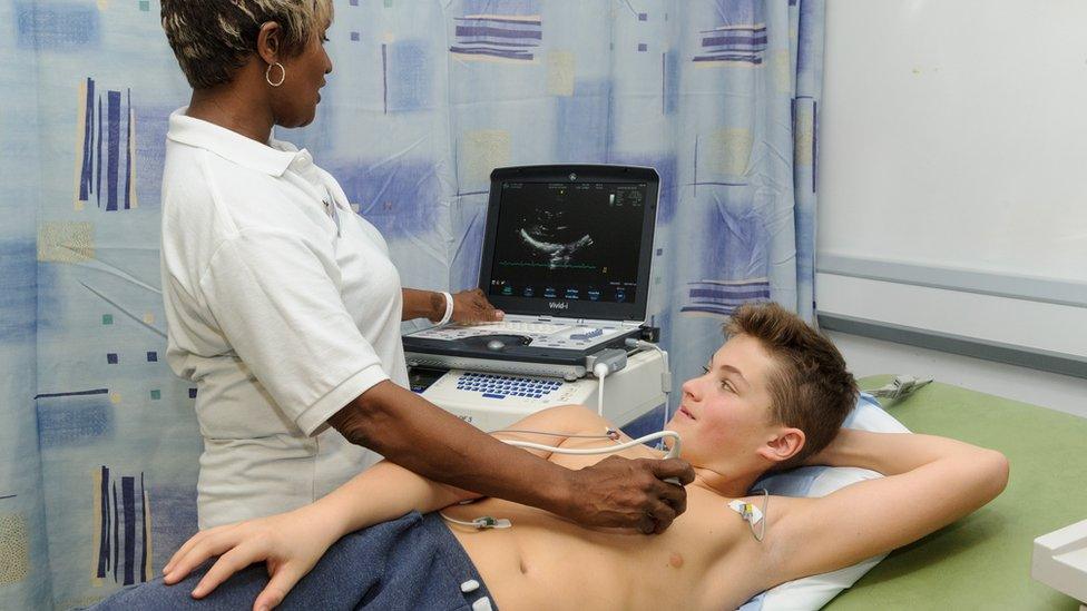 A young person being screened