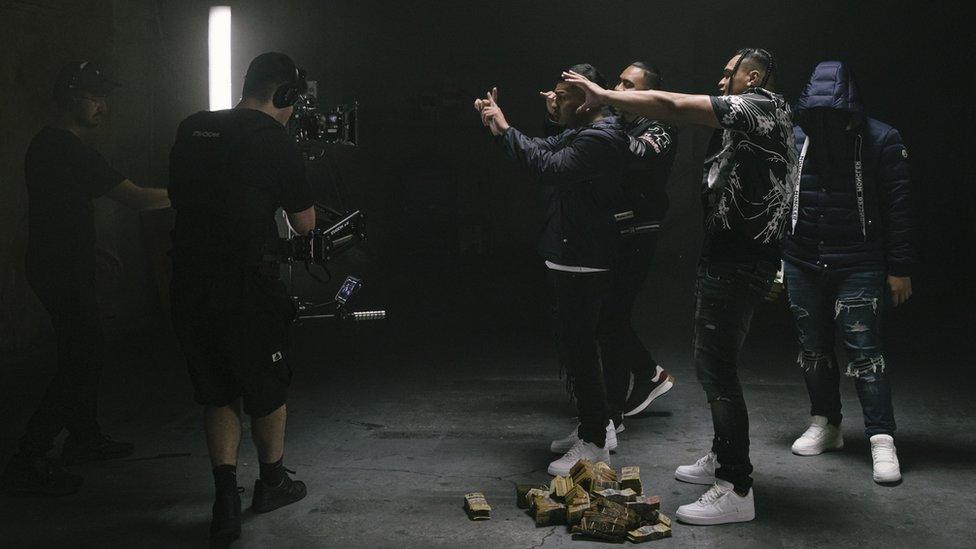 OneFour on the set of their new music video