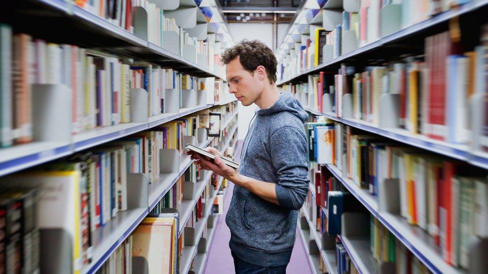 Man in library