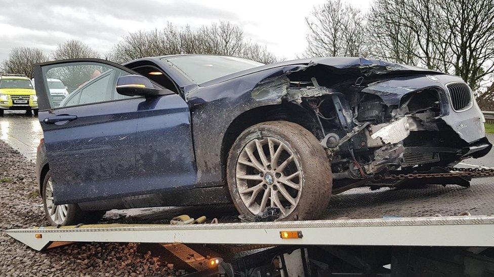 South Wales Police warned motorists to take care in wet conditions following a crash on the M4 near Bridgend