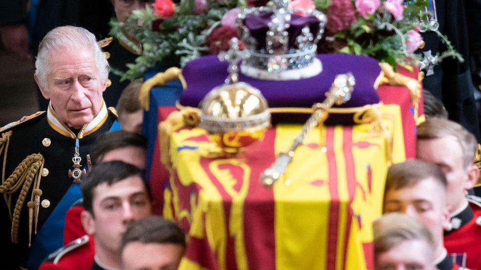 King Charles III and members of the royal family follow behind the coffin of Queen Elizabeth II.