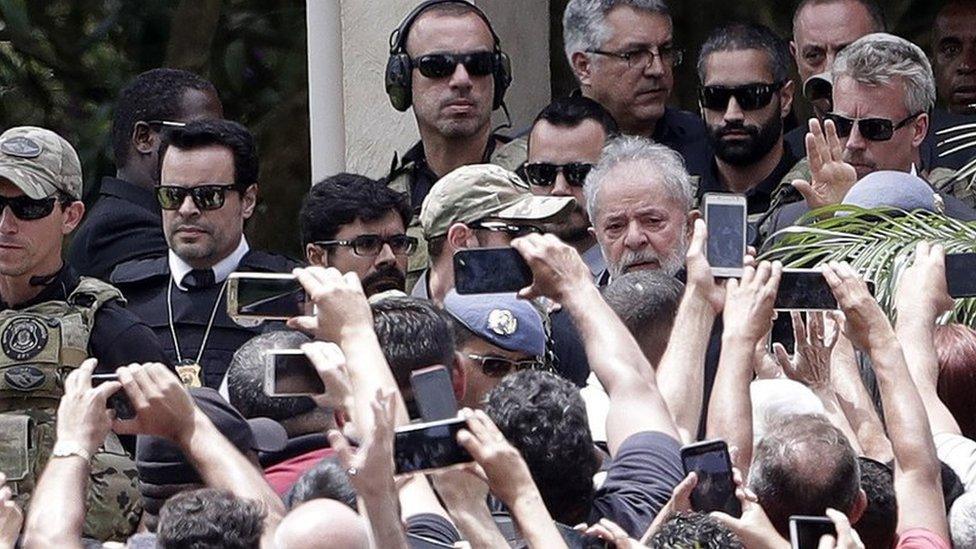 Brazilian former President Luiz Inacio Lula da Silva leaves the place where the funeral of his grandson Arthur Araujo Lula da Silva is celebrated