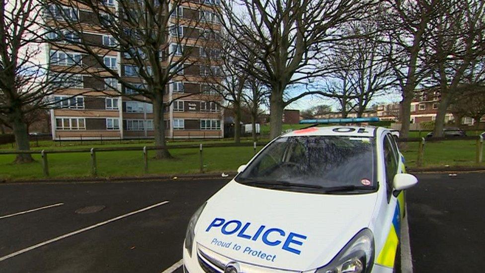 Police car outside flats